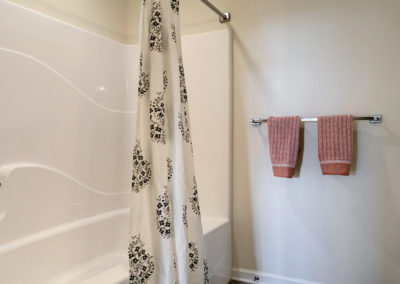 Shower and towels in a Lancaster apartment